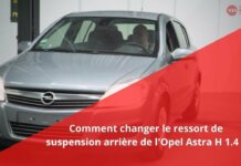 Comment remplacer le ressort de suspension arrière sur une Opel Astra H 1.4 ?